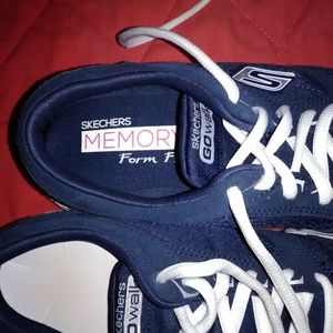 Womens skechers size 7  1/2 navy blue comfort firm sneakers.